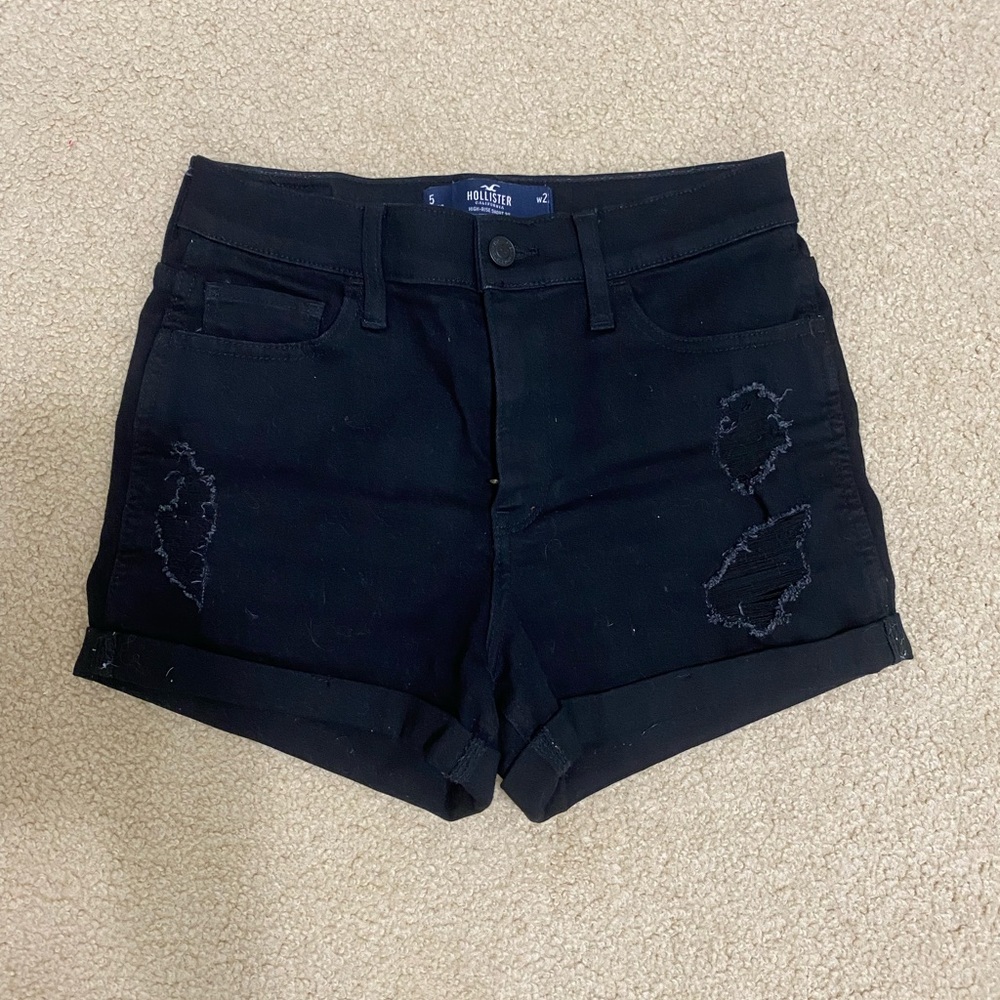 black ripped denim shorts